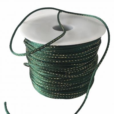 Cordon vert lurex 2 mm.